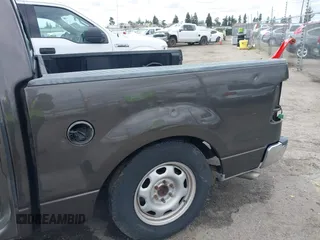 2005 Ford F-150 XLT with VIN 1FTPW12575KB99409, listed as a IAAI auction lot 41711304 with 1 mi miles. Bid and sale history available at carsss.com. Image 17.