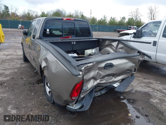2003 Ford F-150 with VIN 2FTRX17L13CA34390, listed as a IAAI auction lot 41869497 with 114,221 mi miles and . Bid and sale history available at DreamBid. Image 3.