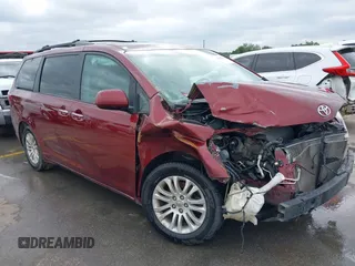 2015 Toyota Sienna XLE with VIN 5TDYK3DC0FS565597, listed as a IAAI auction lot 42062160 with 181,543 mi miles. Bid and sale history available at carsss.com. Image 1.