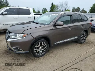 2016 Mitsubishi Outlander ES with VIN JA4AZ2A34GZ604147, listed as a Copart auction lot 58972975 with 138,759 mi miles and Salvage title. Bid and sale history available at DreamBid. Image 1.
