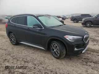 2021 BMW X1 xDrive28i with VIN WBXJG9C07M5T06155, listed as a Copart auction lot 84222754 with 18,466 mi miles and Salvage Title. Bid and sale history available at carsss.com. Image 4.