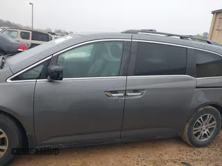 2011 Honda Odyssey EX-L with VIN 5FNRL5H66BB103352, listed as a IAAI auction lot 41901832 with 238,727 mi miles and . Bid and sale history available at carsss.com. Image 15.
