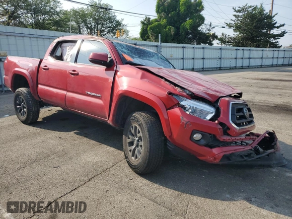 2023 Toyota Tacoma SR with VIN 3TMCZ5AN2PM605302, listed as a Copart auction lot 60495855 with 41,264 mi miles and Clean title. Bid and sale history available at DreamBid. Image 4.