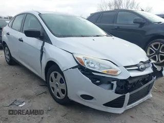 2013 Ford Focus S with VIN 1FADP3E20DL332636, listed as a IAAI auction lot 40917274 with 112,956 mi miles. Bid and sale history available at carsss.com. Image 1.
