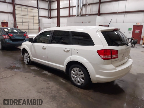 2015 Dodge Journey American Value z VIN 3C4PDCAB4FT714200, wystawiony jako IAAI lot #42199910 z przebiegiem 205 009 mil mil oraz . Historia ofert i sprzedaży dostępna na DreamBid. Obrazek 3.