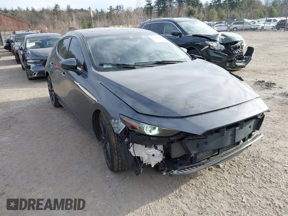 2021 Mazda 3 Premium with VIN JM1BPAML2M1310374, listed as a IAAI auction lot 41190608 with 97,648 mi miles and . Bid and sale history available at DreamBid. Image 1.