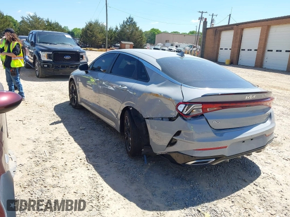 2022 Kia K5 GT-Line z VIN 5XXG64J23NG156401, wystawiony jako IAAI lot #42051123 z przebiegiem 71 853 mil mil oraz . Historia ofert i sprzedaży dostępna na DreamBid. Obrazek 3.