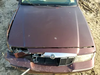 2001 Mercury Grand Marquis LS z VIN 2MEFM75W41X706118, wystawiony jako Copart lot #84484434 z przebiegiem 104 946 mil mil oraz Szkoda całkowita • Salvage title. Historia ofert i sprzedaży dostępna na DreamBid. Obrazek 12.