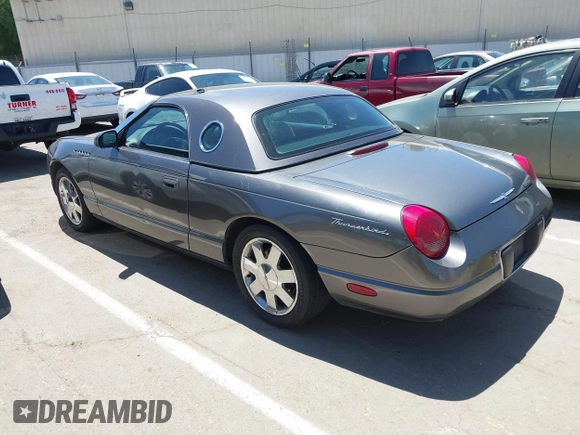 2003 Ford Thunderbird Deluxe z VIN 1FAHP60AX3Y109880, wystawiony jako IAAI lot #42336922 z przebiegiem 213 477 mil mil oraz . Historia ofert i sprzedaży dostępna na DreamBid. Obrazek 3.