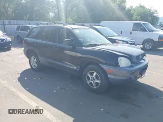 2003 Hyundai Santa Fe GLS z VIN KM8SC13D03U454682, wystawiony jako IAAI lot #42427653 z przebiegiem 234 706 mil mil oraz . Historia ofert i sprzedaży dostępna na DreamBid. Obrazek 1.