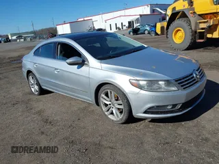 2013 Volkswagen CC Lux with VIN WVWRN7AN2DE506840, listed as a IAAI auction lot 41843448 with 152,344 mi miles. Bid and sale history available at carsss.com. Image 1.