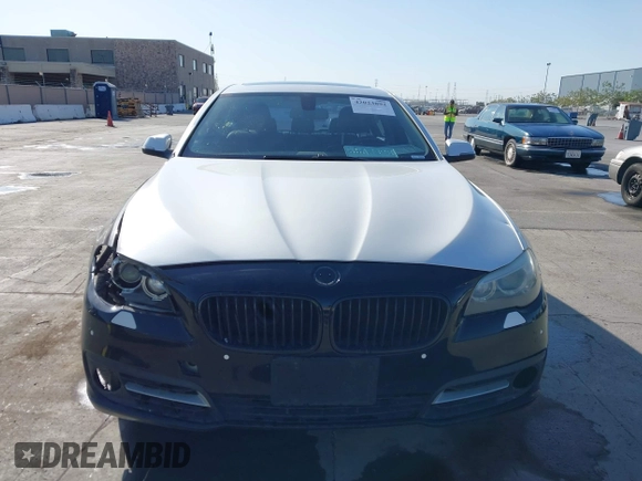 2015 BMW 5 Series 528i with VIN WBA5A5C59FD524043, listed as a IAAI auction lot 42023892 with 94,216 mi miles and . Bid and sale history available at carsss.com. Image 12.