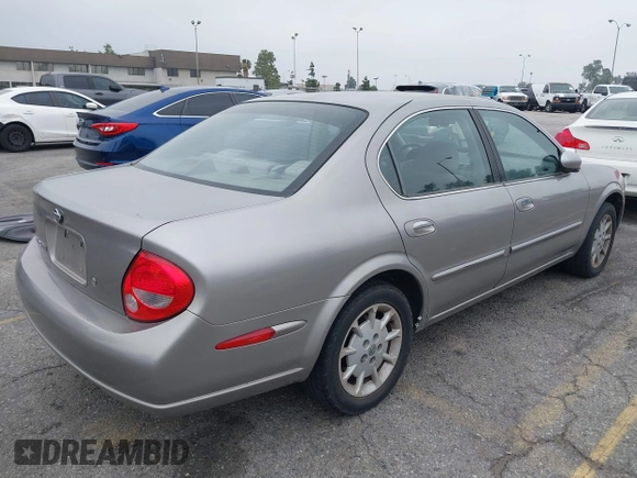 2000 Nissan Maxima GXE z VIN JN1CA31D0YT754624, wystawiony jako IAAI lot #42299290 z przebiegiem 81 958 mil mil oraz . Historia ofert i sprzedaży dostępna na DreamBid. Obrazek 4.