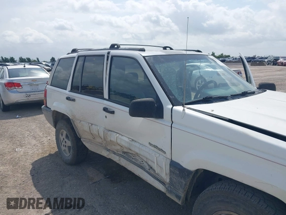 1994 Jeep Grand Cherokee Laredo with VIN 1J4FX58SXRC120936, listed as a IAAI auction lot 42530212 with 126,367 mi miles and . Bid and sale history available at DreamBid. Image 14.