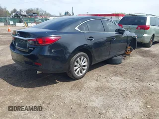 2017 Mazda 6 Sport with VIN JM1GL1U54H1102781, listed as a IAAI auction lot 41972751 with 90,022 mi miles. Bid and sale history available at carsss.com. Image 4.
