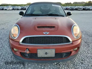 2013 MINI Roadster S z VIN WMWSY3C55DT594614, wystawiony jako Copart lot #87357464 z przebiegiem 119 449 mil mil oraz Tytuł czysty. Historia ofert i sprzedaży dostępna na DreamBid. Obrazek 5.
