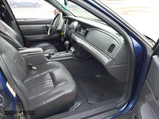 2003 Mercury Marauder with VIN 2MEHM75V33X674412, listed as a IAAI auction lot 41879734 with 181,984 mi miles. Bid and sale history available at carsss.com. Image 5.
