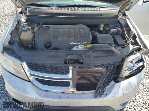 2014 Dodge Journey SXT z VIN 3C4PDCBG7ET126901, wystawiony jako Copart lot #52882625 z przebiegiem 176 923 mil mil oraz Szkoda całkowita • Salvage title. Historia ofert i sprzedaży dostępna na DreamBid. Obrazek 12.