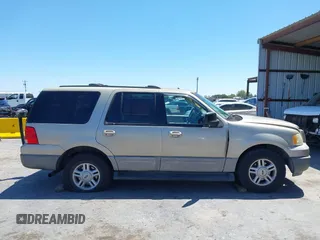 2004 Ford Expedition XLT with VIN 1FMPU16W04LA01850, listed as a IAAI auction lot 42303611 with 190,515 mi miles and . Bid and sale history available at DreamBid. Image 14.