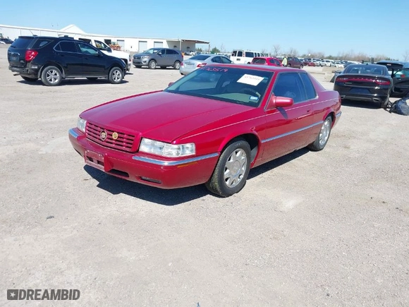 1998 Cadillac Eldorado Touring ETC with VIN 1G6ET1293WU602183, listed as a IAAI auction lot 41763519 with 105,571 mi miles. Bid and sale history available at carsss.com. Image 2.
