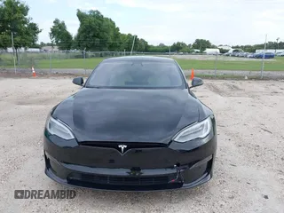 2022 Tesla Model S with VIN 5YJSA1E51NF472152, listed as a IAAI auction lot 42625943 with 60,290 mi miles and . Bid and sale history available at DreamBid. Image 6.