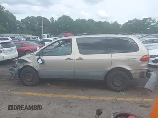 2000 Toyota Sienna LE z VIN 4T3ZF13C4YU309866, wystawiony jako IAAI lot #42184370 z przebiegiem 176 171 mil mil oraz . Historia ofert i sprzedaży dostępna na DreamBid. Obrazek 14.