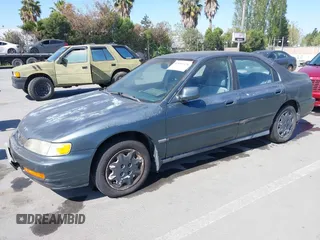 1997 Honda Accord LX with VIN 1HGCD5637VA212185, listed as a IAAI auction lot 42093376 with 239,668 mi miles and . Bid and sale history available at carsss.com. Image 2.