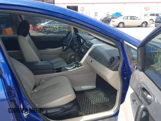 2007 Mazda CX-7 Sport with VIN JM3ER293370157768, listed as a IAAI auction lot 41924682 with 123,391 mi miles. Bid and sale history available at carsss.com. Image 5.