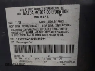 2009 Mazda 6 i Touring with VIN 1YVHP82A495M38694, listed as a IAAI auction lot 41577128 with 230,557 mi miles and . Bid and sale history available at carsss.com. Image 9.