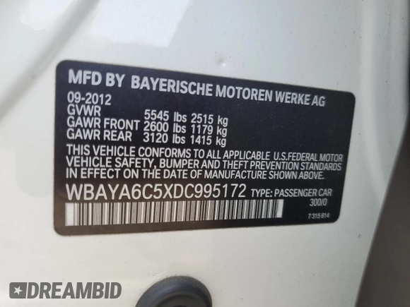 2013 BMW 7 Series 740i with VIN WBAYA6C5XDC995172, listed as a Copart auction lot 60288685 with 28,144 mi miles and Salvage title. Bid and sale history available at DreamBid. Image 13.