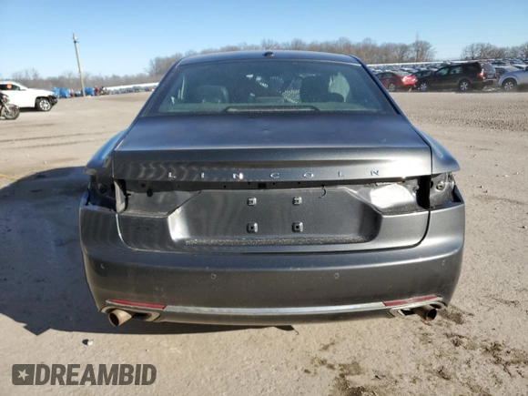 2017 Lincoln Continental Select z VIN 1LN6L9TP1H5600891, wystawiony jako Copart lot #83060344 z przebiegiem Nie podano mil oraz Czysty tytuł • Clean title. Historia ofert i sprzedaży dostępna na DreamBid. Obrazek 6.
