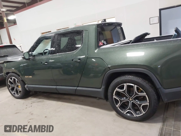 2022 Rivian R1T Adventure Package with VIN 7FCTGAAA0NN004365, listed as a IAAI auction lot 41534730 with 1 mi miles. Bid and sale history available at carsss.com. Image 14.