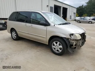 2000 Mazda MPV DX with VIN JM3LW28G0Y0116245, listed as a Copart auction lot 71654914 with 330,693 mi miles and Salvage Title. Bid and sale history available at carsss.com. Image 4.