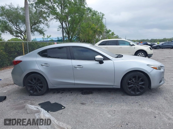 2017 Mazda 3 Touring with VIN 3MZBN1V76HM108148, listed as a IAAI auction lot 41911568 with 194,363 mi miles and . Bid and sale history available at DreamBid. Image 13.
