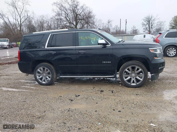 2016 Chevrolet Tahoe LTZ with VIN 1GNSKCKC2GR104305, listed as a IAAI auction lot 41697868 with 124,670 mi miles. Bid and sale history available at carsss.com. Image 13.