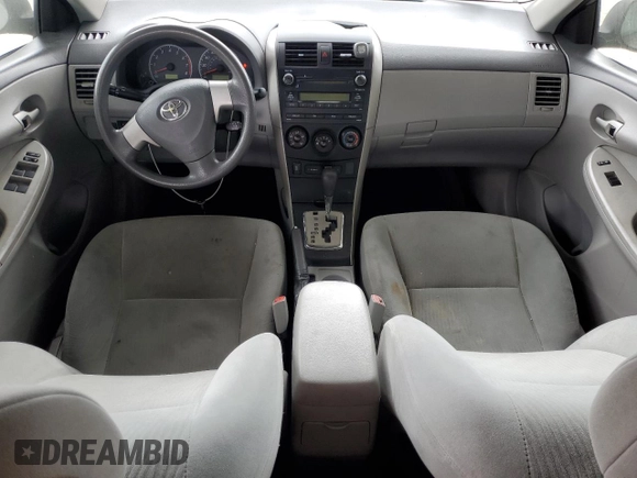 2010 Toyota Corolla with VIN 1NXBU4EE8AZ187793, listed as a Copart auction lot 63909235 with 65,164 mi miles and Salvage title. Bid and sale history available at DreamBid. Image 8.