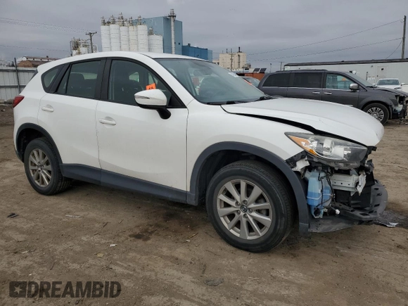 2015 Mazda CX-5 Sport z VIN JM3KE4BY2F0516574, wystawiony jako Copart lot #84100544 z przebiegiem Nie podano mil oraz Szkoda całkowita • Salvage title. Historia ofert i sprzedaży dostępna na DreamBid. Obrazek 4.