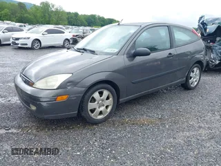 2002 Ford Focus ZX3 with VIN 3FAFP31322R232138, listed as a IAAI auction lot 42253174 with 178,405 mi miles and . Bid and sale history available at DreamBid. Image 2.