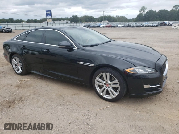 2017 Jaguar XJ with VIN SAJWA1C73H8W10544, listed as a Copart auction lot 70025724 with 64,437 mi miles and Salvage Title. Bid and sale history available at carsss.com. Image 4.