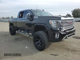 2020 GMC Sierra 3500HD Denali z VIN 1GT49WEY8LF341558, wystawiony jako Copart lot #42609425 z przebiegiem 70 658 mil mil oraz Szkoda całkowita • Salvage title. Historia ofert i sprzedaży dostępna na DreamBid. Obrazek 4.