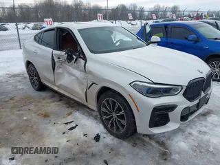2023 BMW X6 M50i with VIN 5UXCY8C02P9N80310, listed as a IAAI auction lot 41619497 with 19,686 mi miles. Bid and sale history available at carsss.com. Image 1.