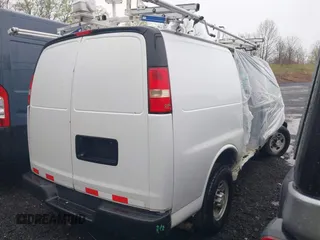 2015 Chevrolet Express Cargo Van with VIN 1GCWGFCF6F1152795, listed as a IAAI auction lot 41912147 with 101,265 mi miles. Bid and sale history available at carsss.com. Image 4.