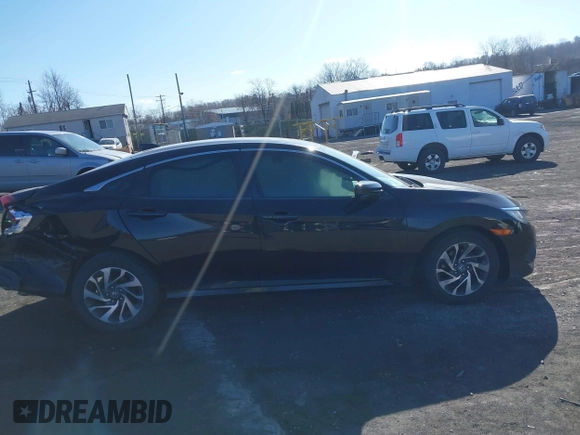 2017 Honda Civic EX with VIN 19XFC2F87HE076134, listed as a IAAI auction lot 41863290 with 61,583 mi miles and . Bid and sale history available at DreamBid. Image 13.
