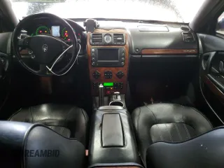 2005 Maserati Quattroporte z VIN ZAMCE39A050015127, wystawiony jako Copart lot #85957714 z przebiegiem 88 278 mil mil oraz Czysty tytuł • Clean title. Historia ofert i sprzedaży dostępna na DreamBid. Obrazek 8.