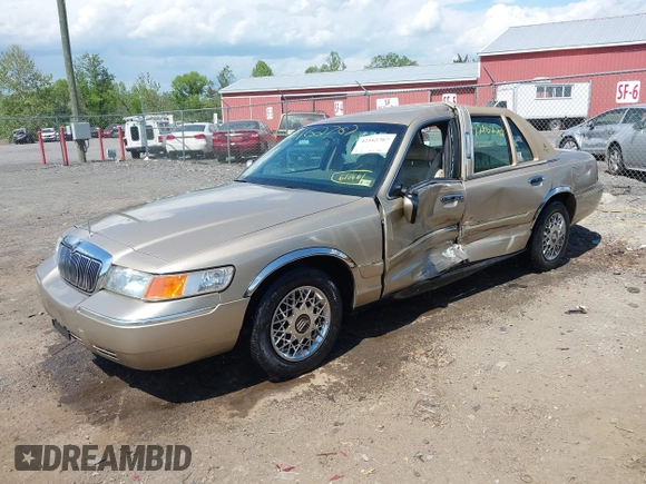 2000 Mercury Grand Marquis GS z VIN 2MEFM74W3YX610461, wystawiony jako IAAI lot #42162767 z przebiegiem 181 400 mil mil oraz . Historia ofert i sprzedaży dostępna na DreamBid. Obrazek 2.