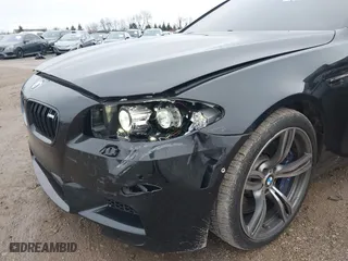 2013 BMW M5 with VIN WBSFV9C51DD095750, listed as a IAAI auction lot 40907304 with 93,014 mi miles. Bid and sale history available at carsss.com. Image 6.