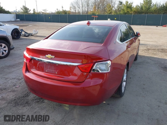 2014 Chevrolet Impala LT with VIN 2G1125S38E9314424, listed as a IAAI auction lot 41973052 with 186,209 mi miles and . Bid and sale history available at DreamBid. Image 4.
