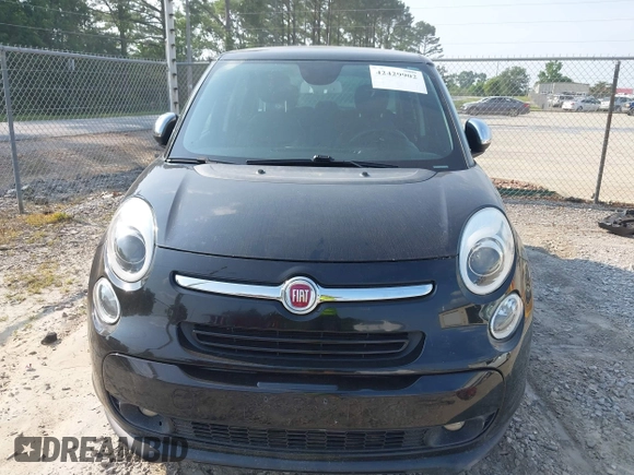 2014 FIAT 500L Lounge with VIN ZFBCFACH6EZ021783, listed as a IAAI auction lot 42429902 with 129,868 mi miles and . Bid and sale history available at DreamBid. Image 6.