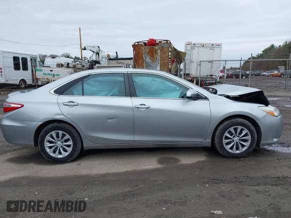 2015 Toyota Camry XLE with VIN 4T4BF1FK1FR468666, listed as a IAAI auction lot 42005934 with 124,173 mi miles and . Bid and sale history available at DreamBid. Image 13.