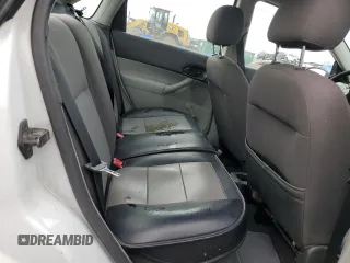 2006 Ford Focus S with VIN 1FAFP34N06W105551, listed as a Copart auction lot 52355575 with 176,617 mi miles and Salvage Title. Bid and sale history available at carsss.com. Image 10.